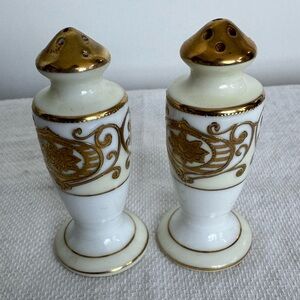 Porcelain salt and pepper shaker set with hand-painted gold scrollwork